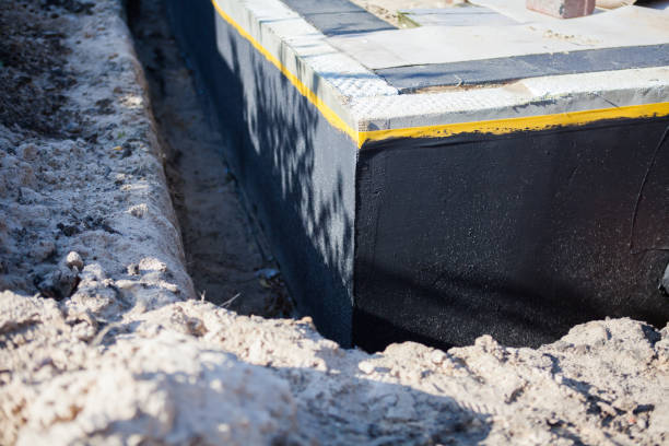 Professional Basement Waterproofing technician working in Williamsport, IN